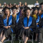 River HomeLink graduates listen intently during their commencement ceremony